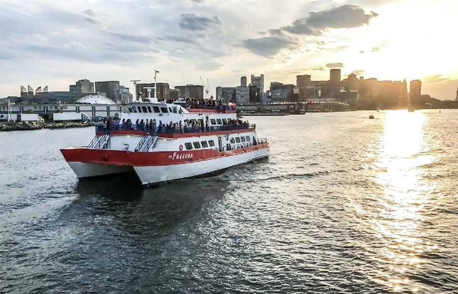 Boston: Boston Harbor Sunset Cruise - Indoor seats, outdoor views, and changing weather