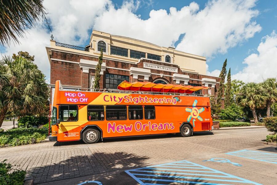 City Sightseeing New Orleans HOHO Bus Tour & Bookable Extras - Stops 6 to 9: Canal Street, the riverfront edge, and downtown