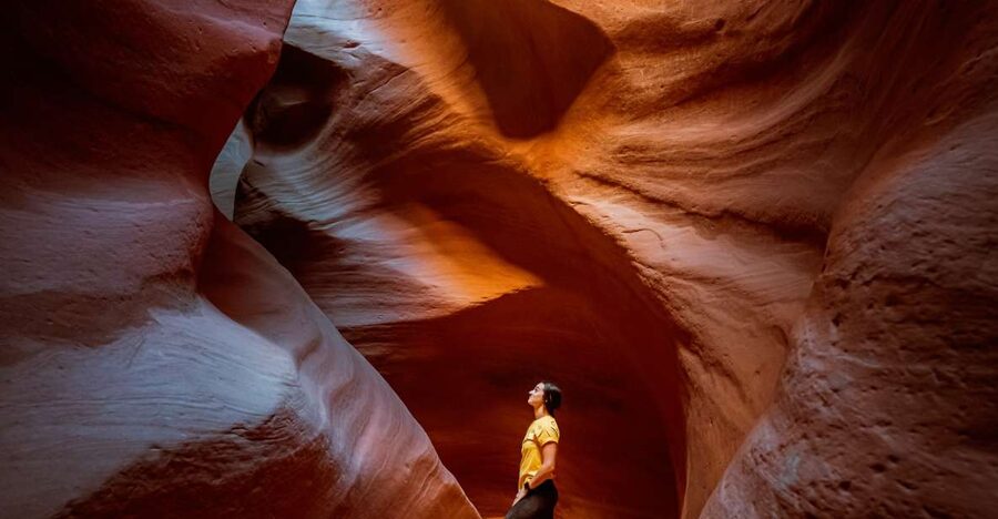 East Zion: Crimson Slot Canyon Exploration and UTV Tour - Entering a narrow canyon shaped by water