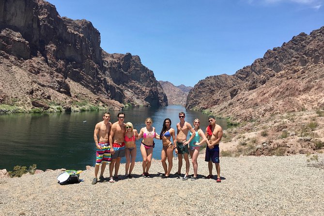 Emerald Cave & Black Canyon Kayak Tour with Vegas Pickup - Getting fitted with a kayak at the river