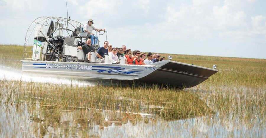 Everglades: Sawgrass Park Day Time Airboat Tour & Exhibits - Skimming across grassy Everglades waterways