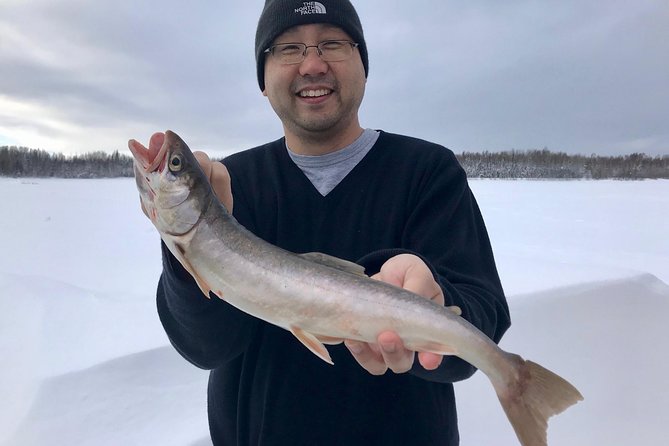 Fairbanks Ice Fishing Expedition in a Heated Cabin with Fish Cookout - A warm start on a frozen lake