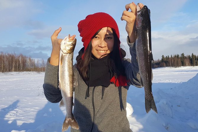 Fairbanks Ice Fishing Expedition in a Heated Cabin with Fish Cookout - Fishing through the cabin floor