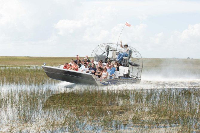 Florida Everglades Airboat Adventure and Wildlife Encounter - The airboat ride across grassy water