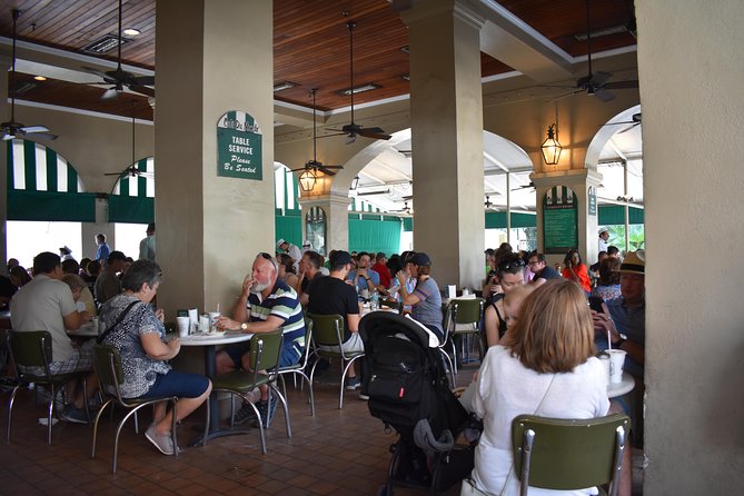 French Quarter Historical Sights and Stories Walking Tour - French Market: stories amid daily activity