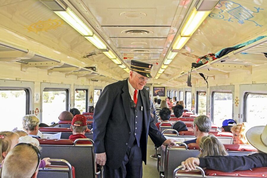 From Williams: Grand Canyon Railway Round-Trip Train Ticket - The hosts make the five-hour rail journey work