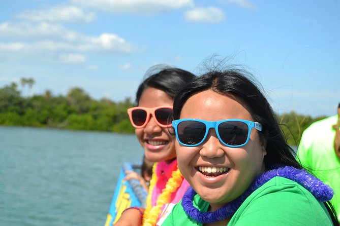 Guaranteed Dolphin Sighting Tour on Tropics Boat Tours - Commentary, coastline, and mansion spotting