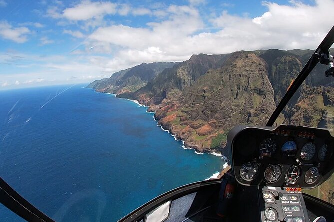 Kauai Private Doors-Off Helicopter: Ultimate Waterfalls & Canyons - Leaving Lihue for Kauai’s green interior