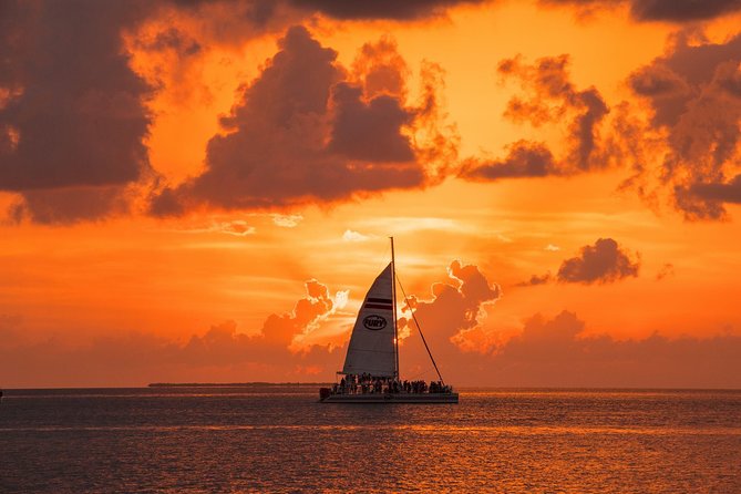 Key West Rum and Reggae: Reef Snorkel Adventure and Sunset Sail - Back aboard: rum punch and reggae