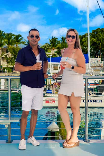 Key West Signature Sunset Cruise with Open Bar, Food & Music - Ordering drinks from the open bar