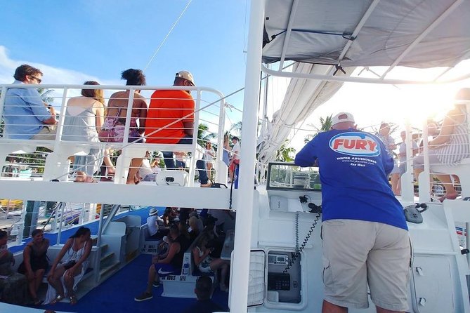 Key West Sunset Sail with Live Music, Drinks and Appetizers - Watching the sunset past Mallory Square