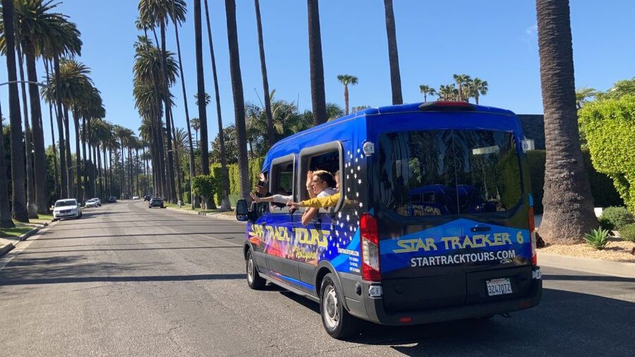 Los Angeles: Hollywood and Beverly Hills Guided Bus Tour - Open-air views, cold weather, and rain