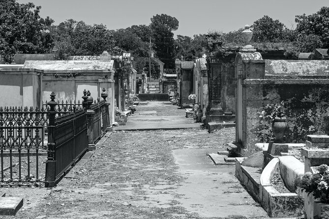 New Orleans Cemetery Bus Tour with Exclusive Cemetery Access - Entering Odd Fellows Rest after dark