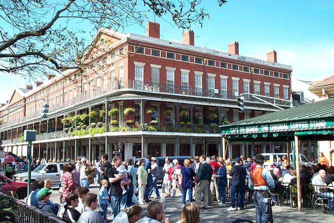 New Orleans City and Cemetery 2-Hour Bus Tour - Garden District mansions and oak-lined streets