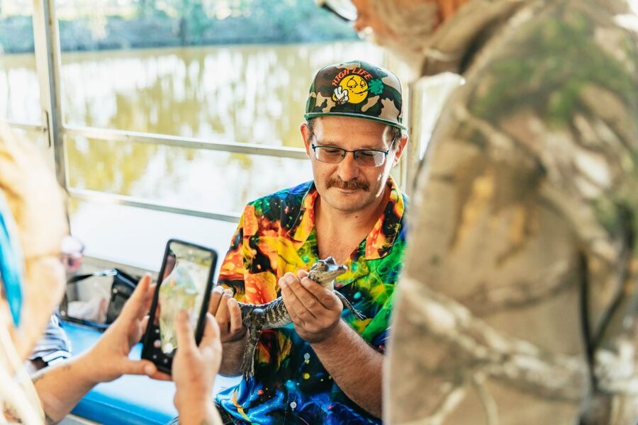 New Orleans: Guided Swamp Cruise by Tour Boat - Boarding a covered boat with room to move