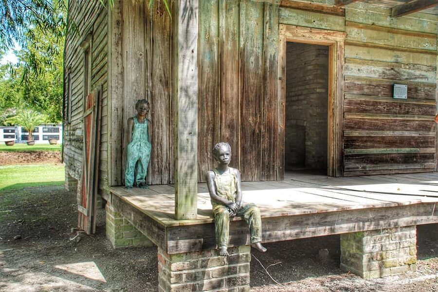 New Orleans: Whitney Plantation Tour with Transportation - The Ride From New Orleans to the River Plantations