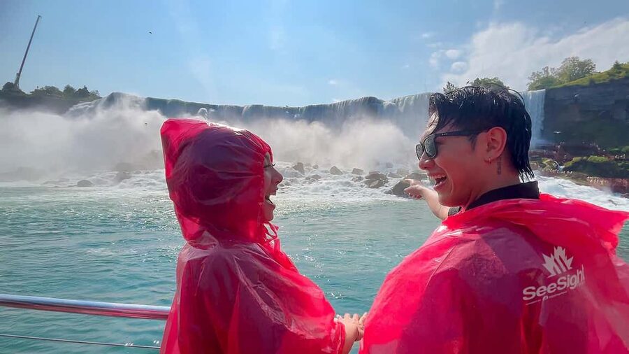 Niagara Falls: Walking Tour, Journey Behind Falls, & Cruise - Meeting the falls from the water
