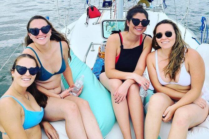 Private Luxury Yacht Charters, BYOB & Dolphins - Dolphins, ships, and working-waterfront views