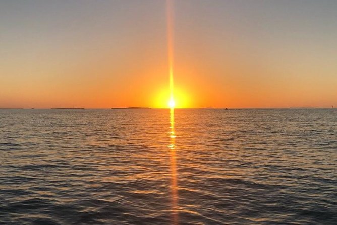 Small Group Key West Adult Sunset & Moët Sail & Amazing Cheeses - Sailing away from the Key West crowd