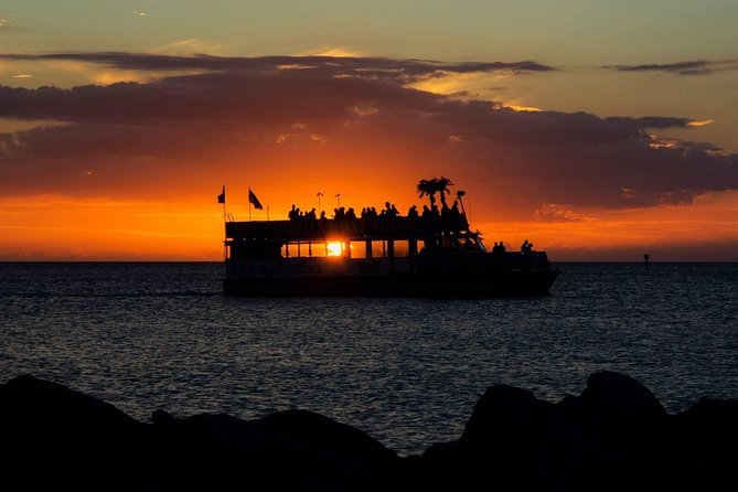 Sunset Celebration Cruise on Tropics Boat Tours - Finding dolphins before the sun drops