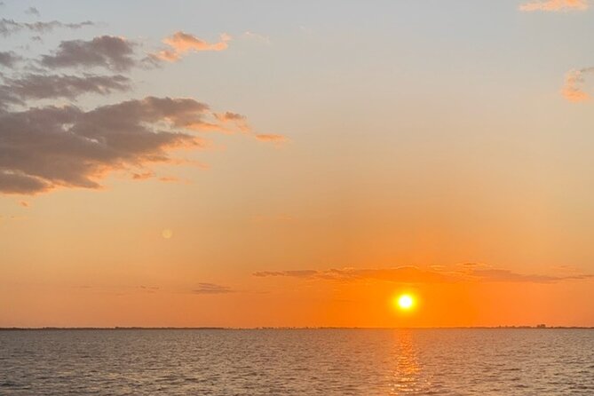 Sunset Dolphin Cruise with Sanibel Lighthouse Views - Bowditch Point and the sunset turn
