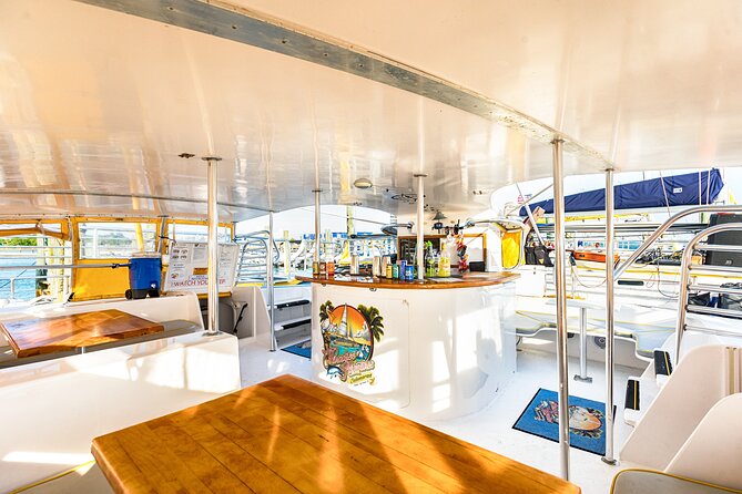 Sunset Dolphin Sail Aboard the Privateer Catamaran - One included drink, then a cashless bar
