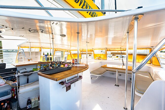 Sunset Dolphin Sail Aboard the Privateer Catamaran - Who will enjoy the Privateer most